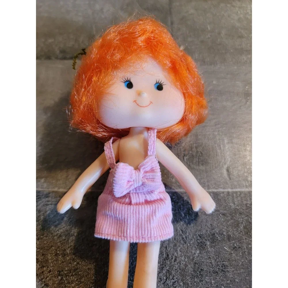 Orange hair girl pink overall doll toy‎ figure